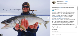 AmeriCorps Member with Fish