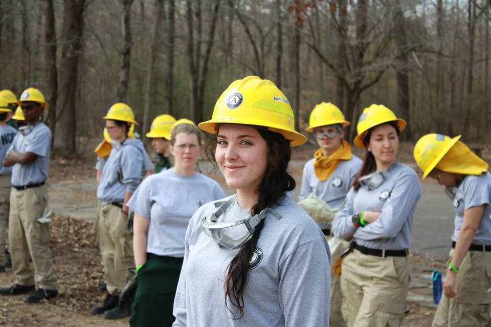Conservation Corps members in the woods