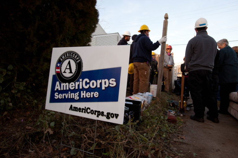 AmeriCorps Serving Here sign