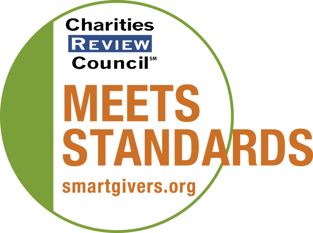 "Meets Standards" Badge of the Charities Review Council. Includes url of "smartgivers.org"