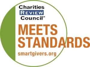"Meets Standards" Badge of the Charities Review Council. Includes url of "smartgivers.org"